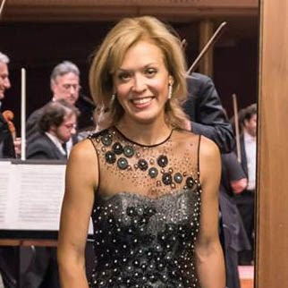Classical pianist Olga Kern sporting Alex Soldier jewelry while performing at Carnegie Hall