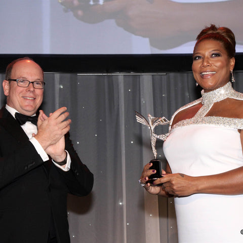 HSH Prince Albert II of Monaco presenting Queen Latifah with Princess Grace Award, designed and created by Alex Soldier.