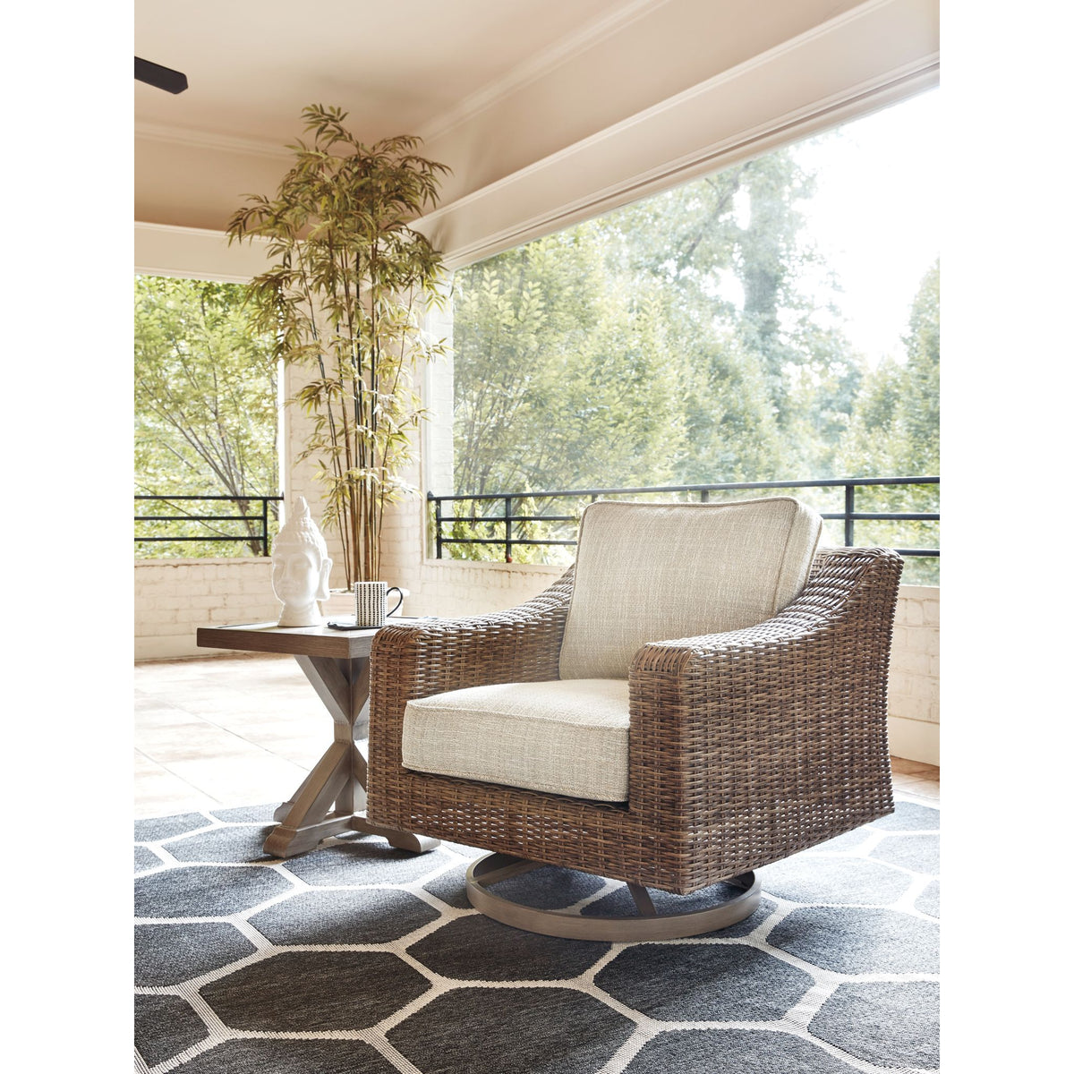 sandestria beige outdoor swivel lounge chair by havenside home