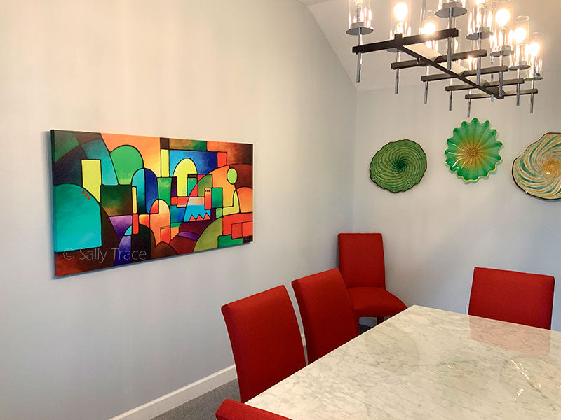 Sally Trace artwork hanging in a modern contemporary dining room