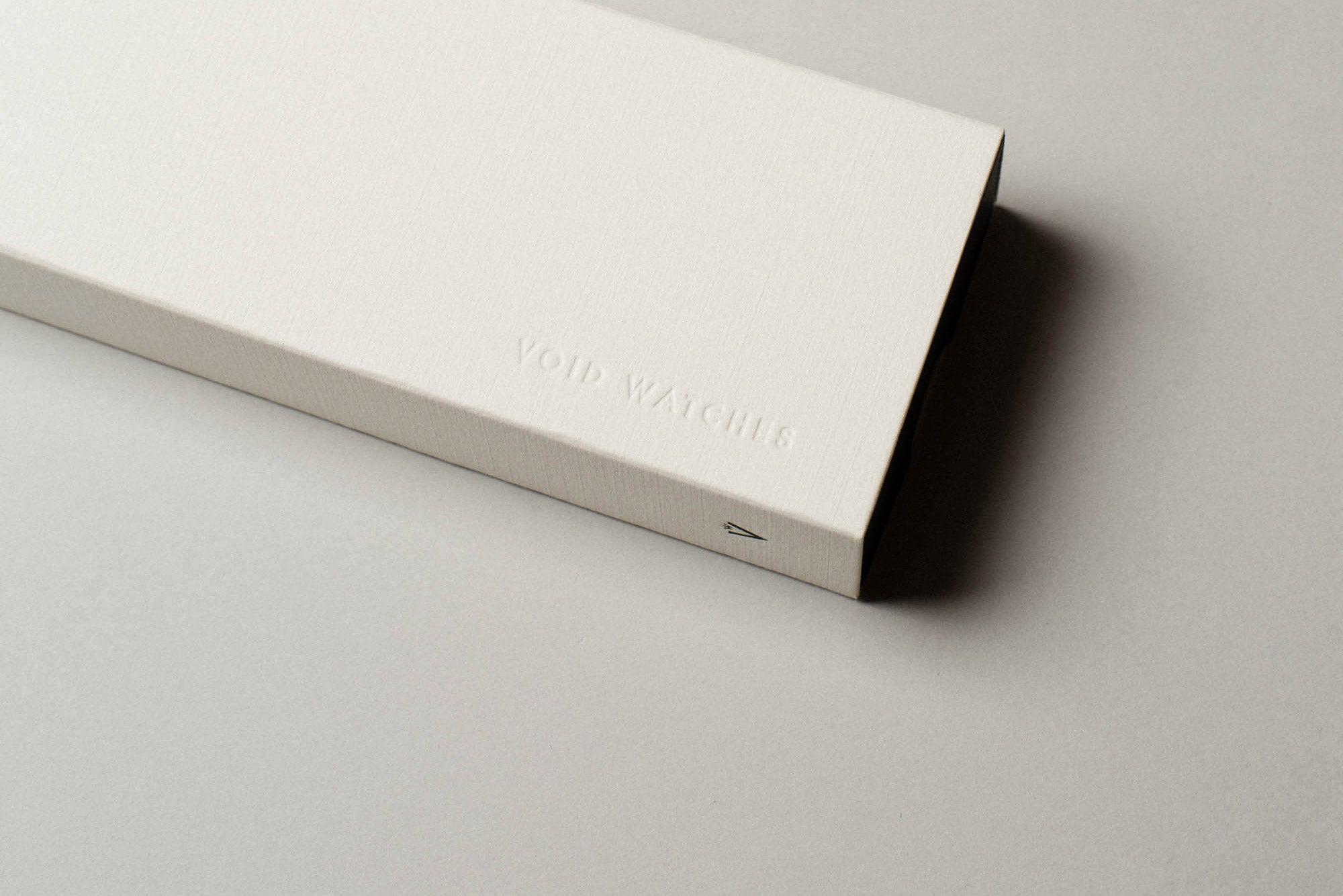 New off-white sleeve packaging for VOID Watches with an invisible debossed logo.