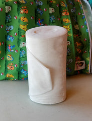 a roll of disposable diaper liners