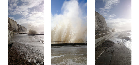 Seaspray on Saltdean promenade esplanade huge waves near brighton England