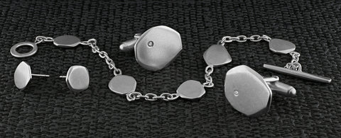 Annika-rutlin-mens-ladies-cufflinks-bracelet-studs-cairn-faceted-pebble-silver-jewelry-collection