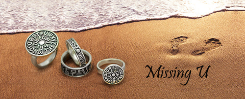 missing you rings in sand beach image annika rutlin silver designer jewellery