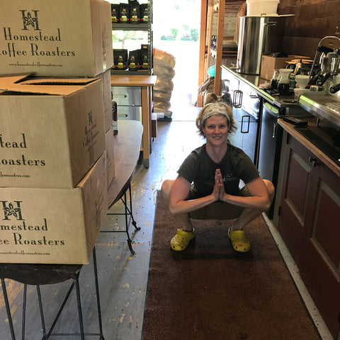 Katie does yoga at Homestead Coffee Roasters