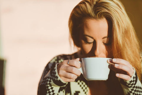 woman drinking her favourite coffee