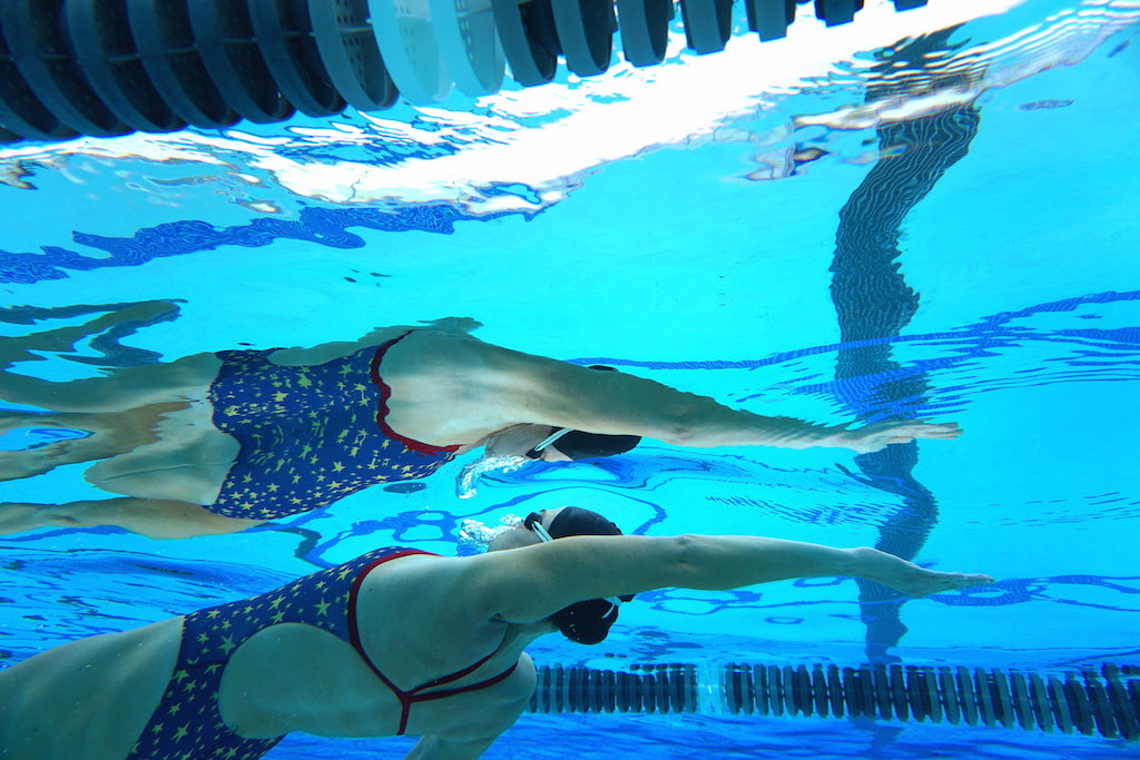 Olympian Kaitlin Sandeno High Five Reflection Underwater Swim Laguna Fin