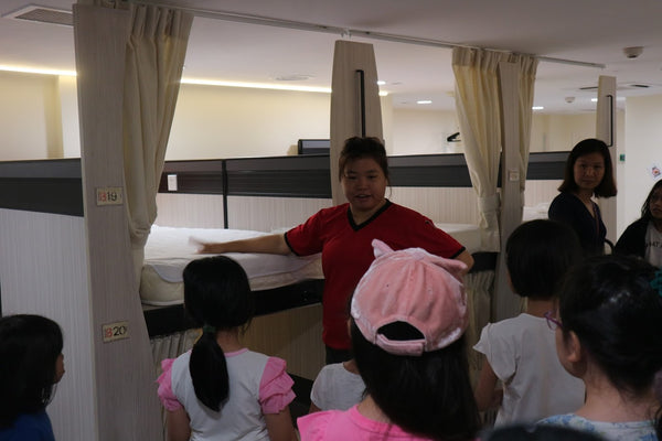 High Achievers Instructor Stressing that kid should not jump off the bed