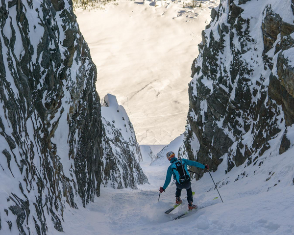 Joel skiing the narrow on funnel of death bow peak