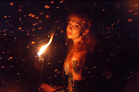 Woman with fire torch