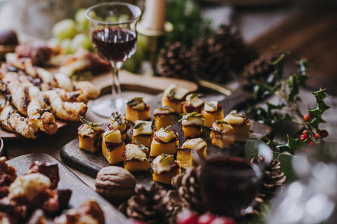 Polenta with vintage cheddar, sage and tomato Quicke's cheese canapes