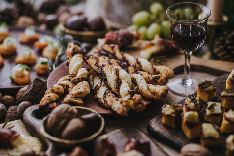 Quicke's Goat's cheese straws with red onion marmalade