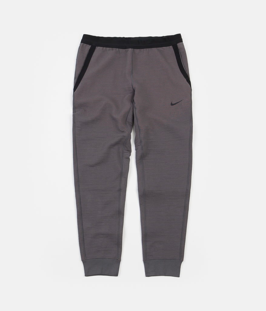 nike tech orange pants