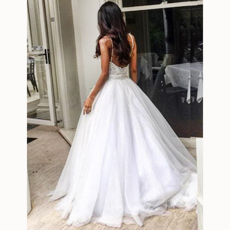 spaghetti strap ball gown wedding dress