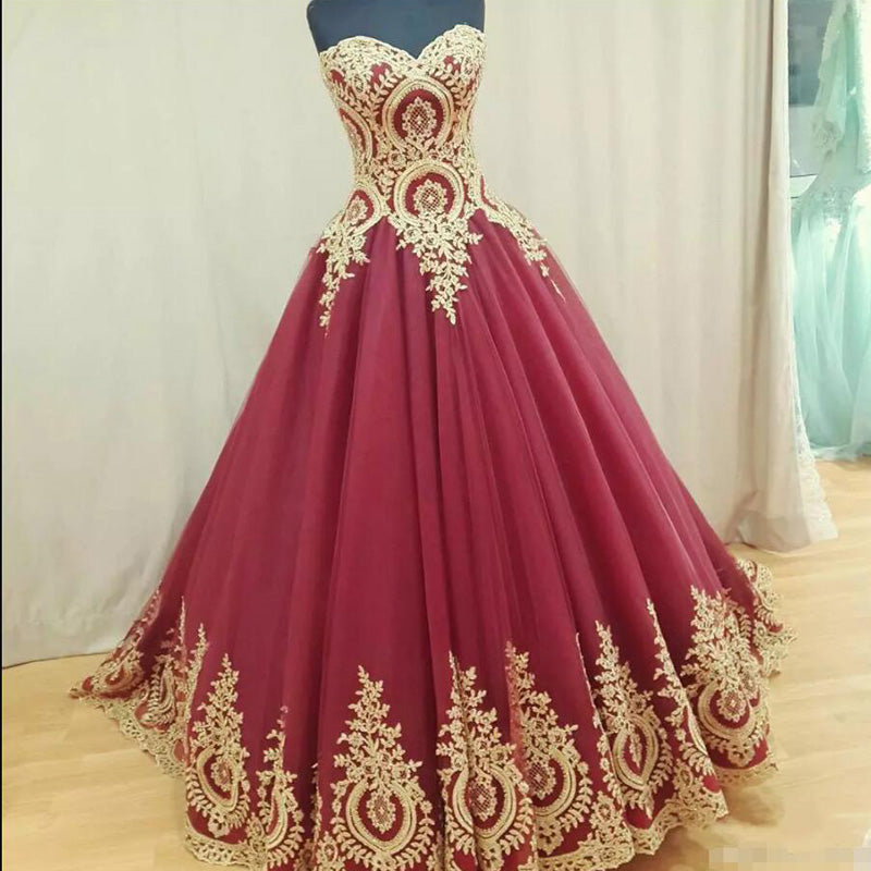 gold and burgundy wedding dress