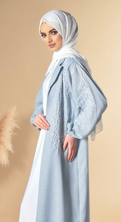 blue abaya with leaf embellishments