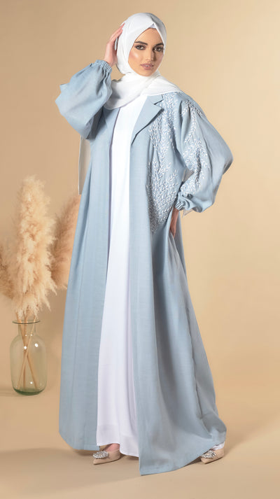 blue abaya with leaf embellishments