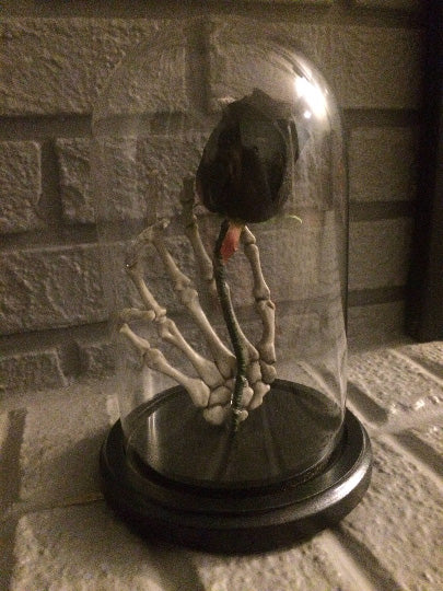 Gothic halloween skeleton hand and black rose engagement proposal prop