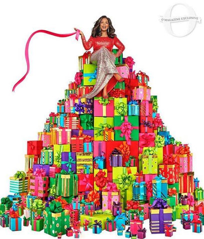 Oprah on a stack of gifts