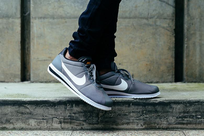 black and gray nike cortez