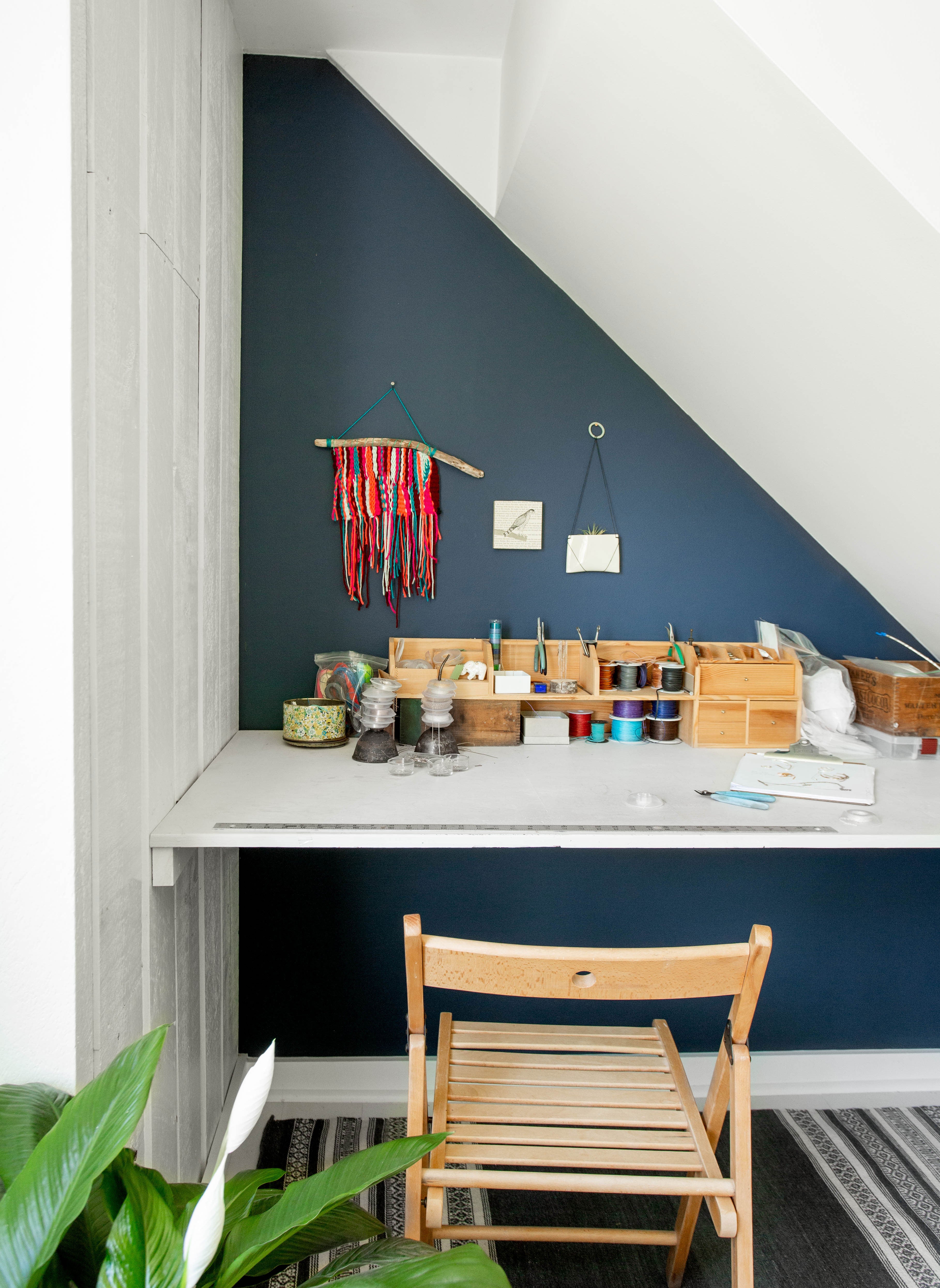 Blue wall behind work desk