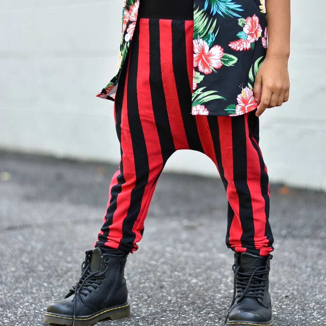 red and black vertical striped pants