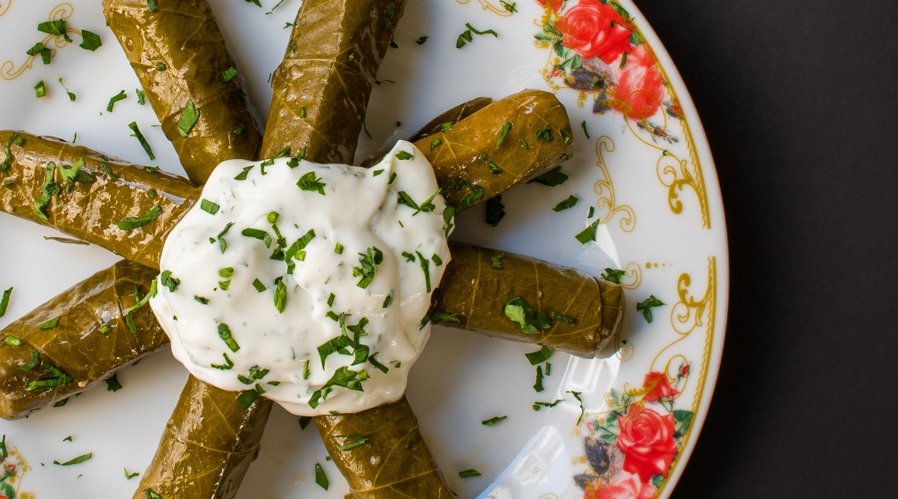 "Dolmadakia with yogurt sauce" English