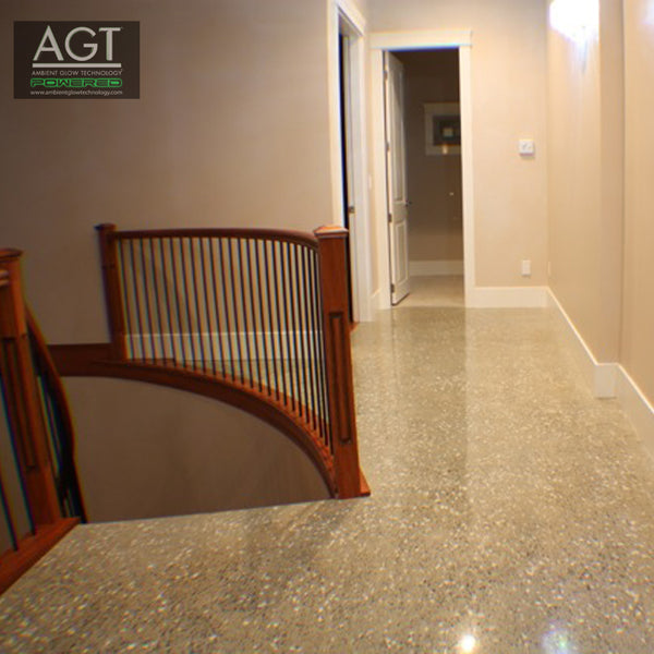 Glowing polished concrete floor powered by AGT™ Sky Blue Glow Stones during the day.