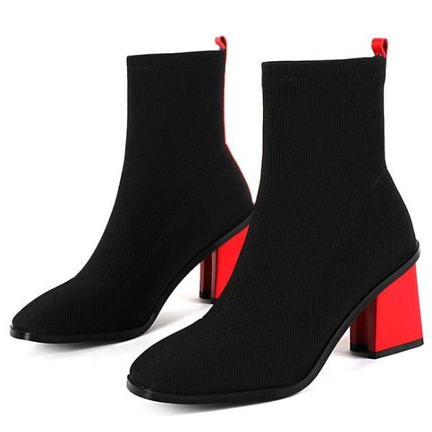 red heeled ankle boots