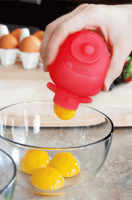 The Mighty Yolk Hero Egg Separator in use