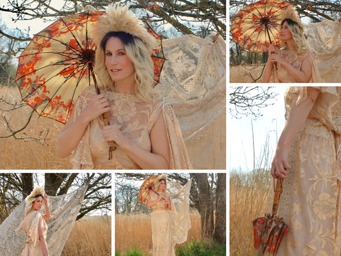 A glamorous look - Jenny wears a floor sweeping gown in gold lace from the 1970's, with a showgirl headdress and antique parasol