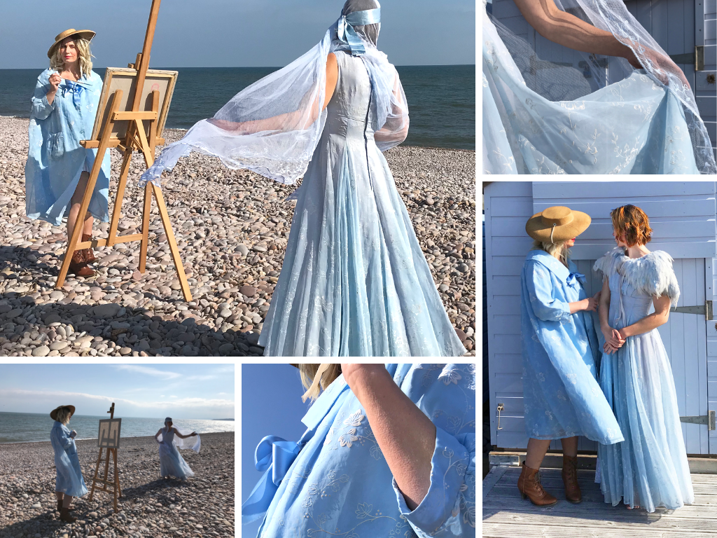 A montage of images of our models on a pebble beach, wearing original vintage blue flocked organza outfits. Josie wears a floor length 1950's dress with a pale blue antique veil flowing from a satin headband. Jenny poses at an easel, paintbrush in hand as though painting Josie, wearing a stylish 1950's swing coat in sky blue 