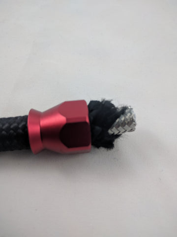 Nylon braid trimmed back on PTFE hose