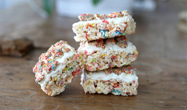 Rice krispies treats with white chocolate and fruity chocolate covered pretzels