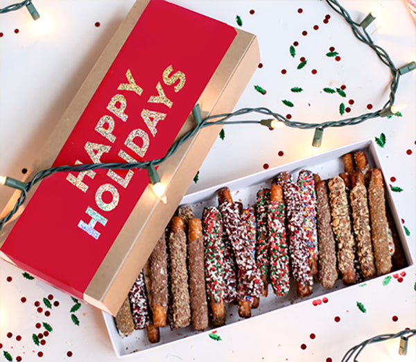 Chocolate covered pretzel holiday gift box with thirty pretzels in assorted flavors