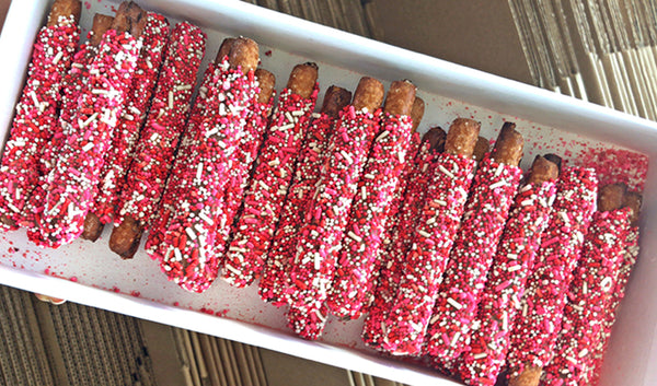 Gift box filled with pink, red and white Valentine's Day Sprinkle pretzels