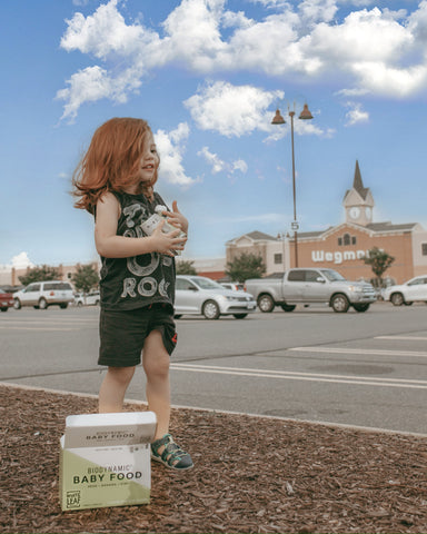 Girl walking with biodynamic baby food