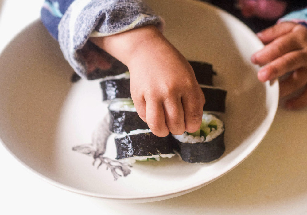 Hand rolled sushi for kids on a Love Mae bamboo dinner plate 