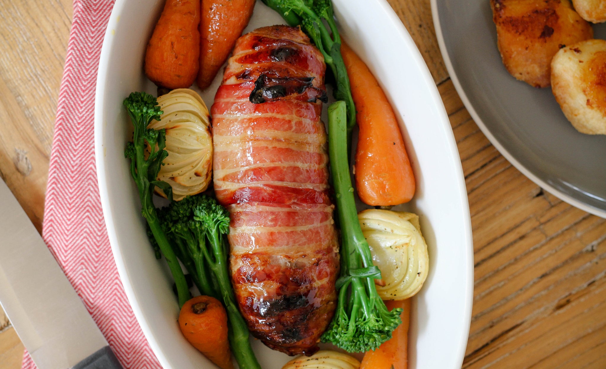 pork tenderloin wrapped in streaky bacon with pork & apple