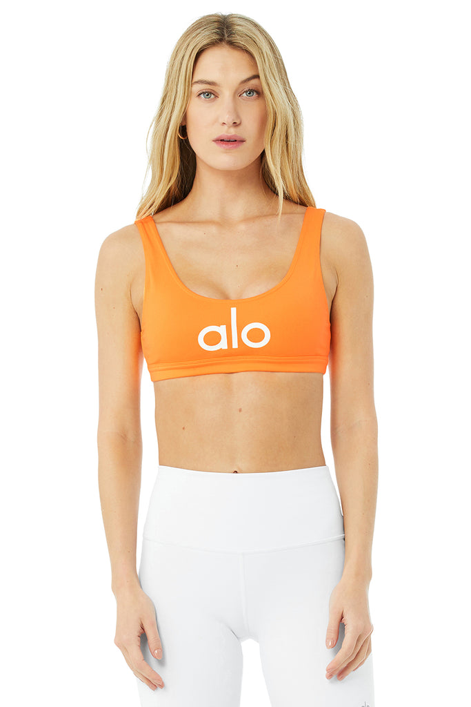 Alo Yoga - Ambient Logo Bra - Neon Apricot/White