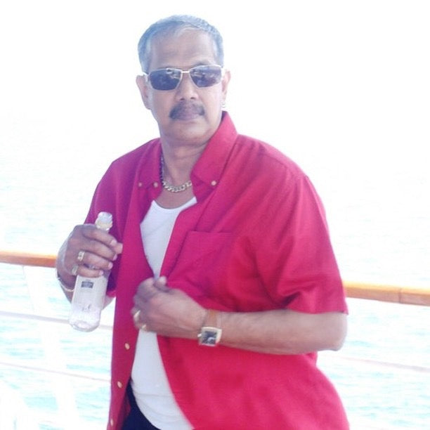 Mr. Armogan on a boat