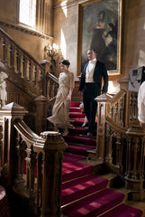 Cast of Downton Abbey PBS series on staircase