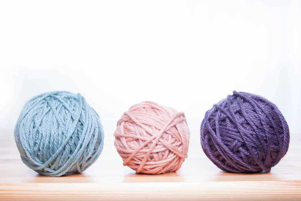 Three balls of yarn