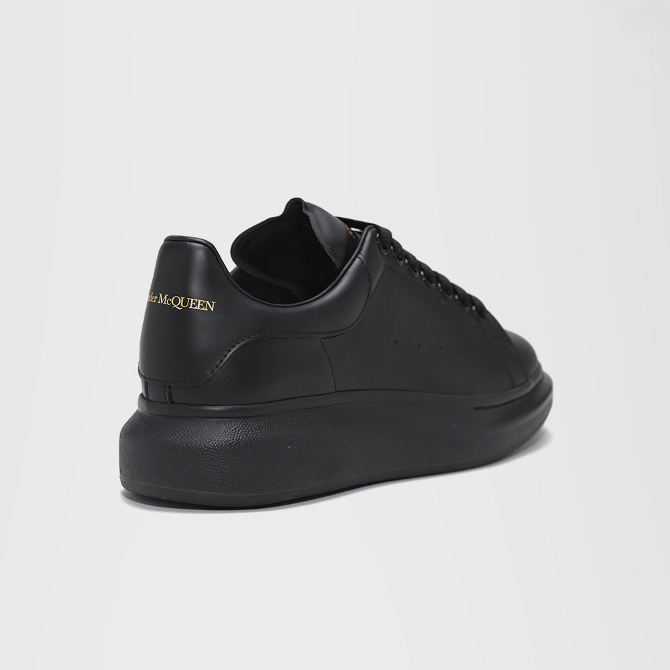 ALEXANDER MCQUEEN RAISED SOLE LOW TOP SNEAKER BLACK