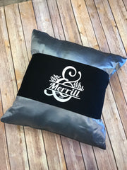 black pillow wrap with white vinyl lettering of Mr & Mrs Last Name