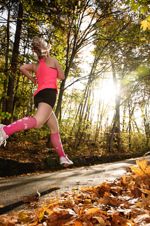 Woman Trail Runner in Pink Compression Socks | Outdoor Athletics