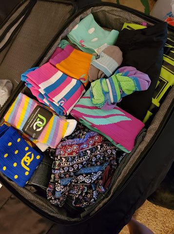 PRO Compression Travel Socks in a Suitcase