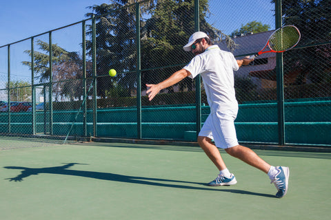 Tennis Player Using PRO Compression Arm Sleeves