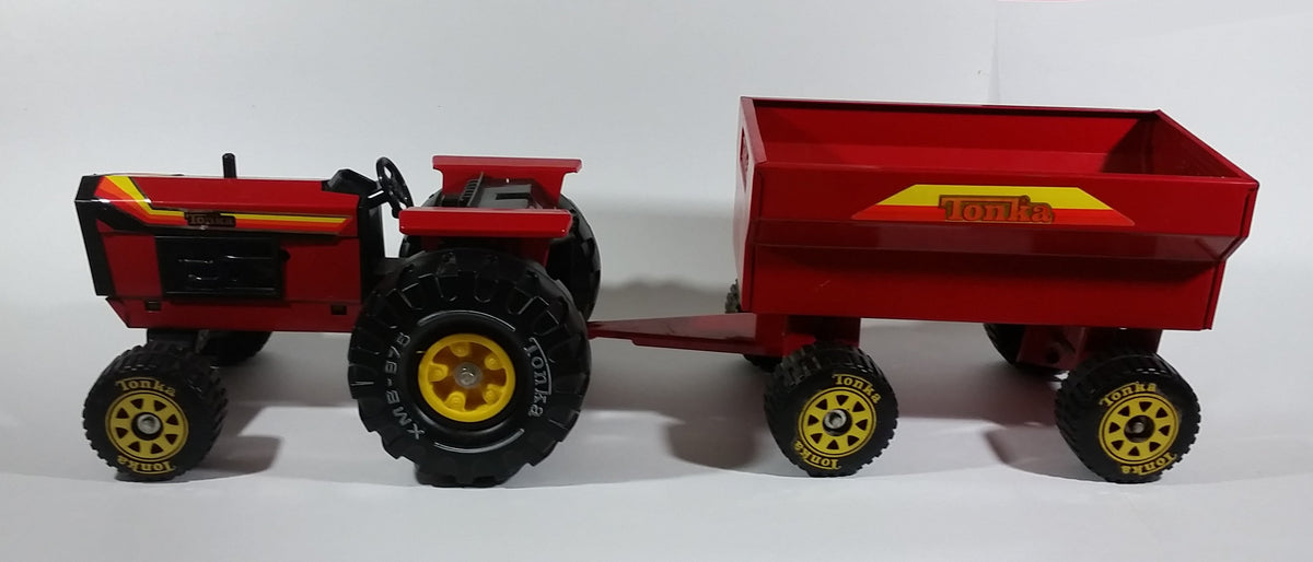Vintage Tonka Tractor with Trailer XMB-975 Red Pressed Steel Toy Farmi –  Treasure Valley Antiques & Collectibles